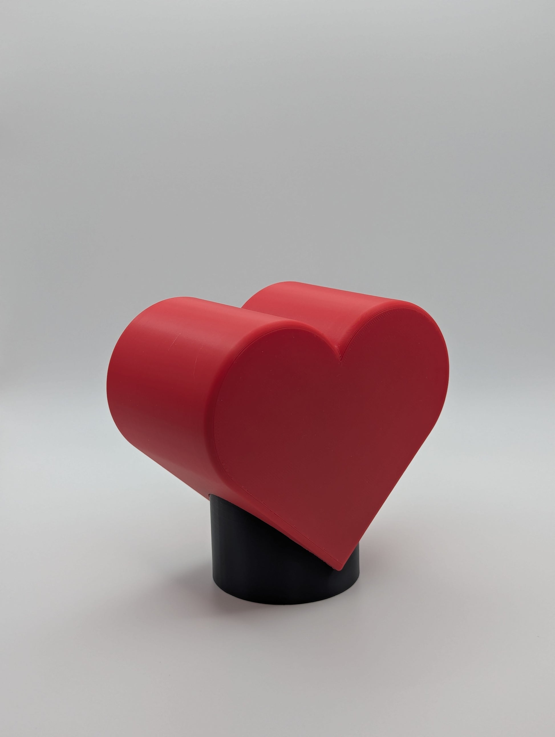 Red Heart Tow Ball Cover viewed at an angle