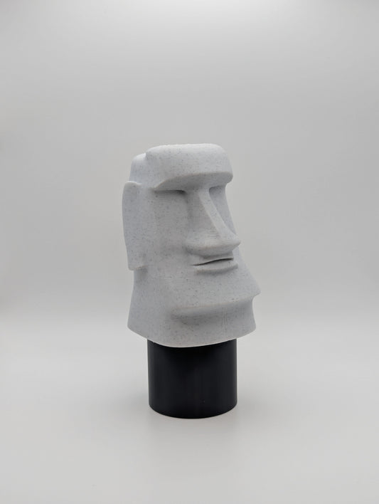 Stone coloured Moai Statue viewed at an angle