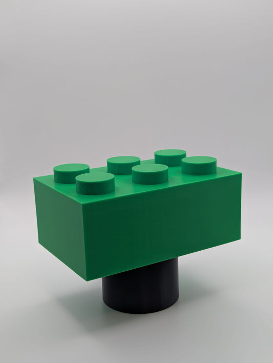 Green Toy Brick Tow Ball Cover viewed at an angle